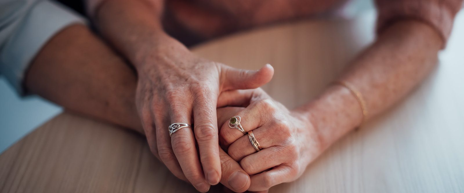 A man and woman holding hands.